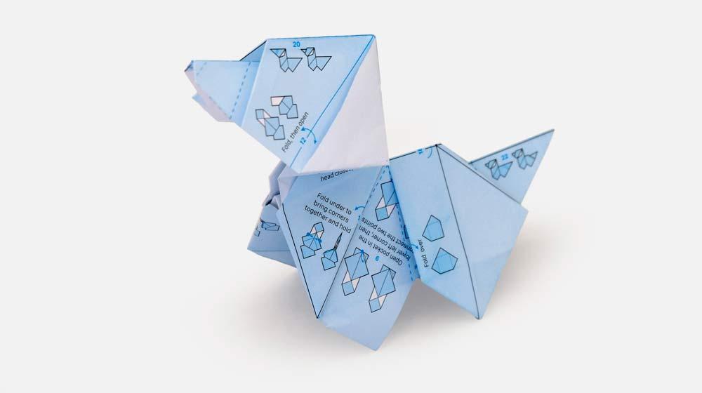 Origami de cachorro criado com o papel de embrulho da ILOVEHANDLES
